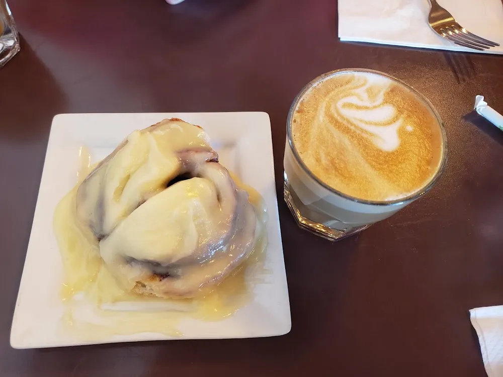 Cinnamon Roll with a Cortado
